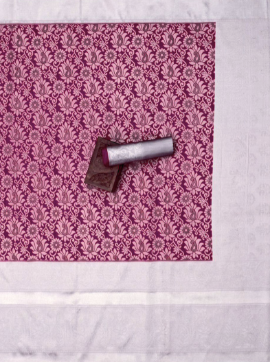 Lipstick on a pink and white patterned fabric