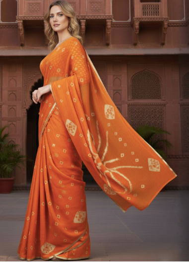 Woman wearing an orange saree with a traditional architectural background