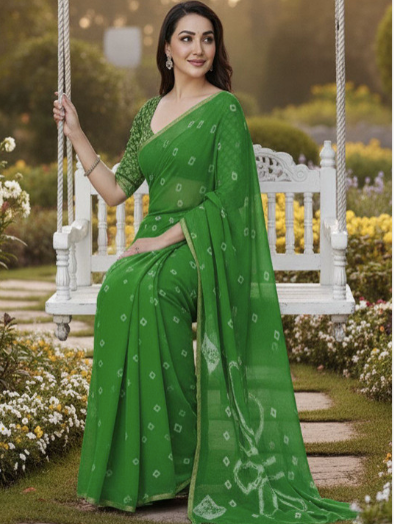 Woman in a green saree sitting on a swing in a garden