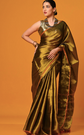 Gold-toned saree Solid saree with no border border