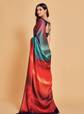 Woman wearing a colorful saree with a gradient design on a beige background