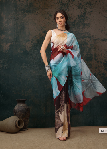 Woman wearing a colorful dress with abstract patterns against a dark background